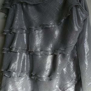 Silver ruffle spaghetti strap tank.  NY and Company size large
